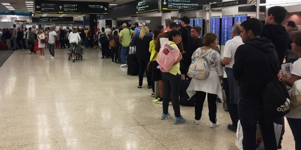 Largas filas en aeropuerto de Miami