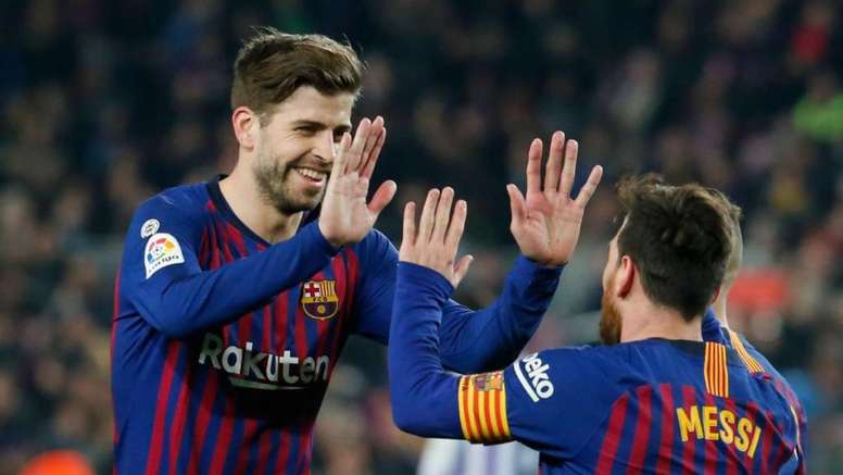 Gerard Piqué y Lionel Messi