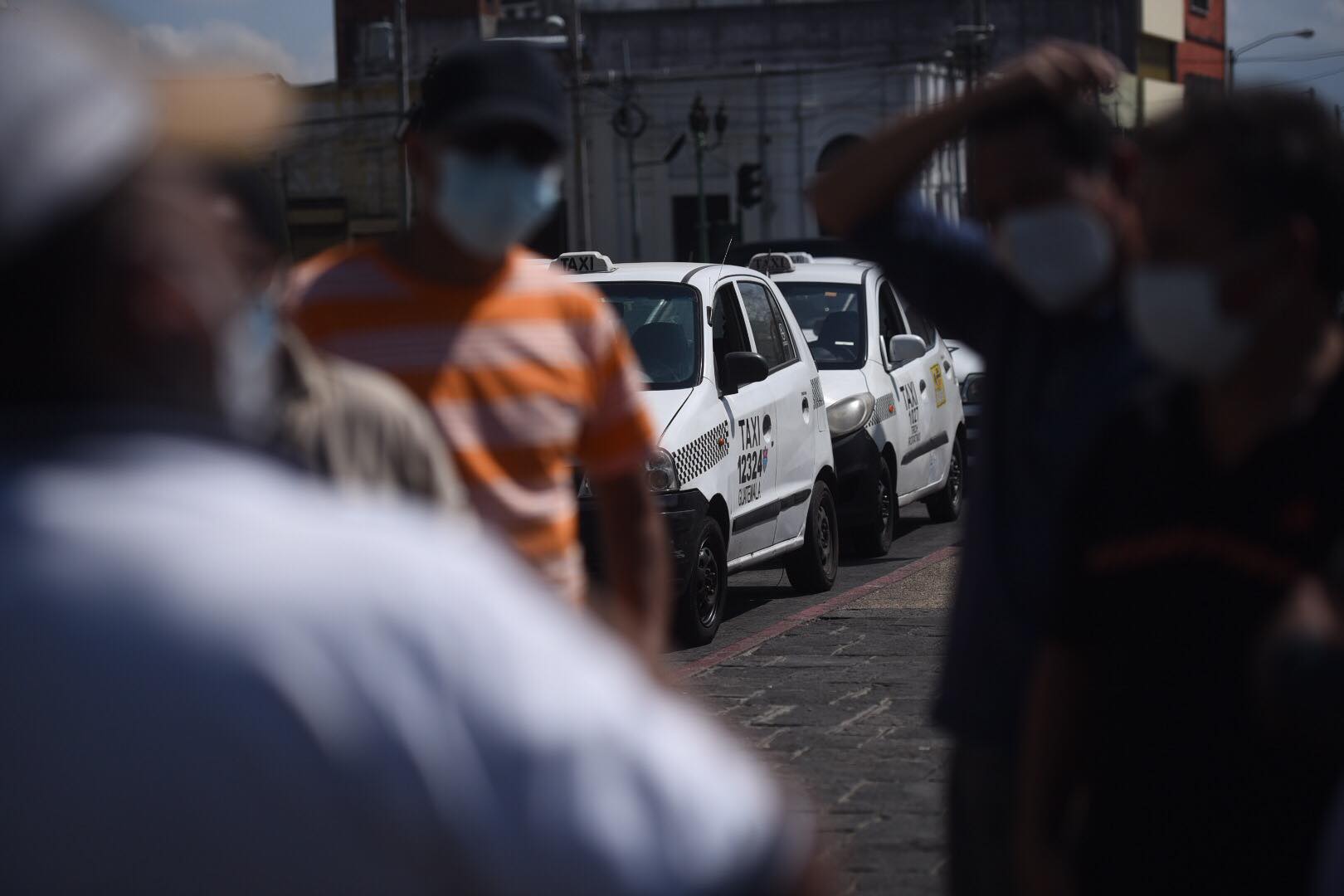 manifestación de taxistas contra pago de seguro en zona 1